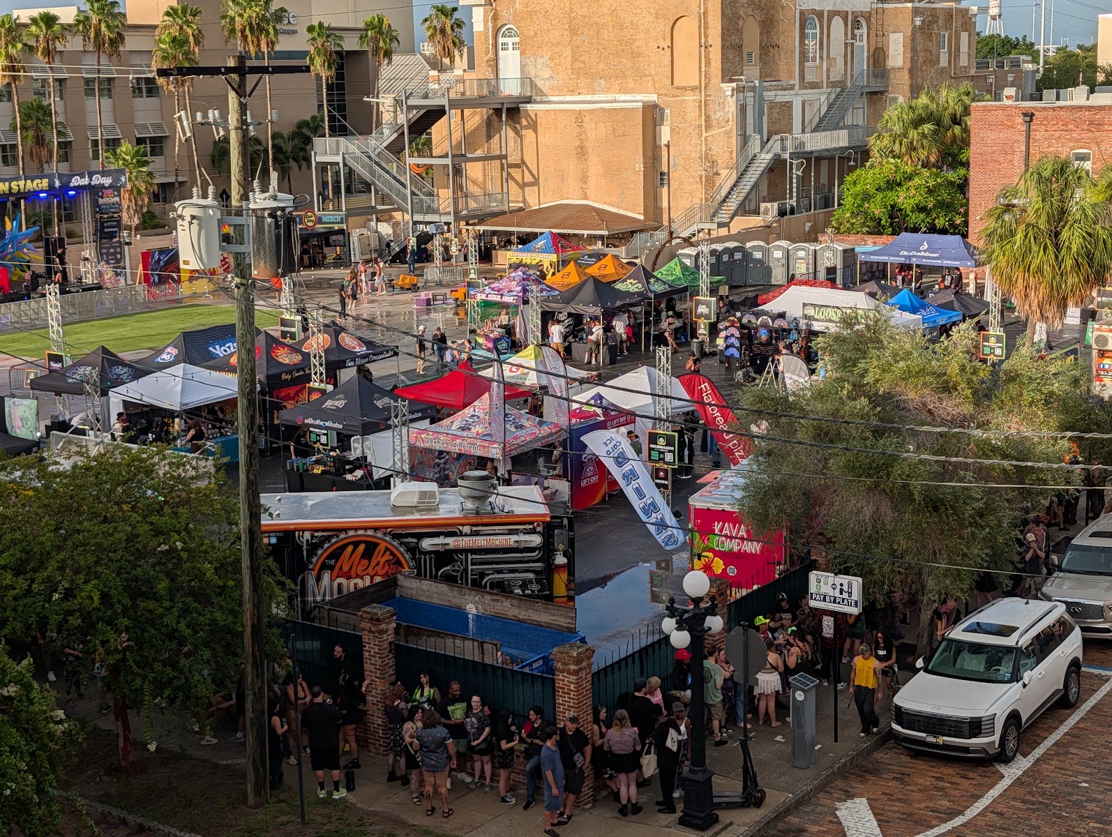 Food trucks and vendor tents packing the outdoor grounds at 710 Dab Day