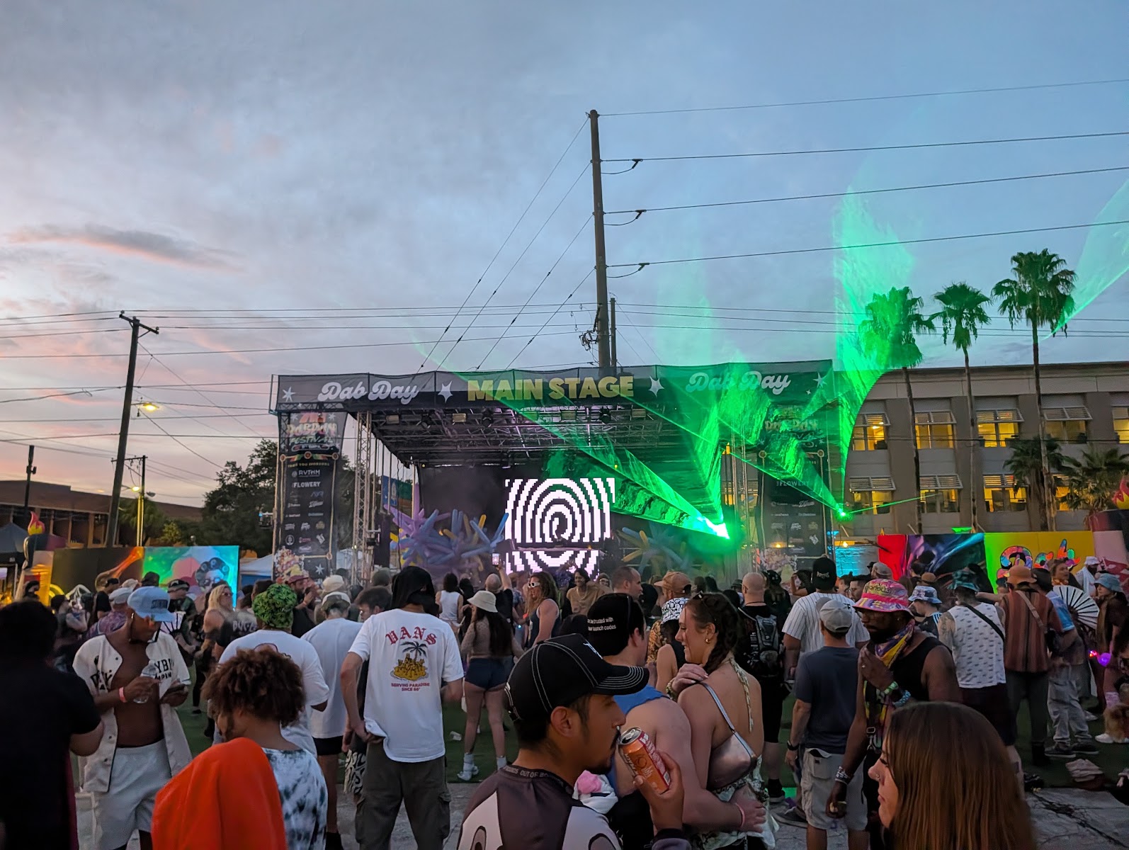 710 Dab Day crowd at night under green stage lighting