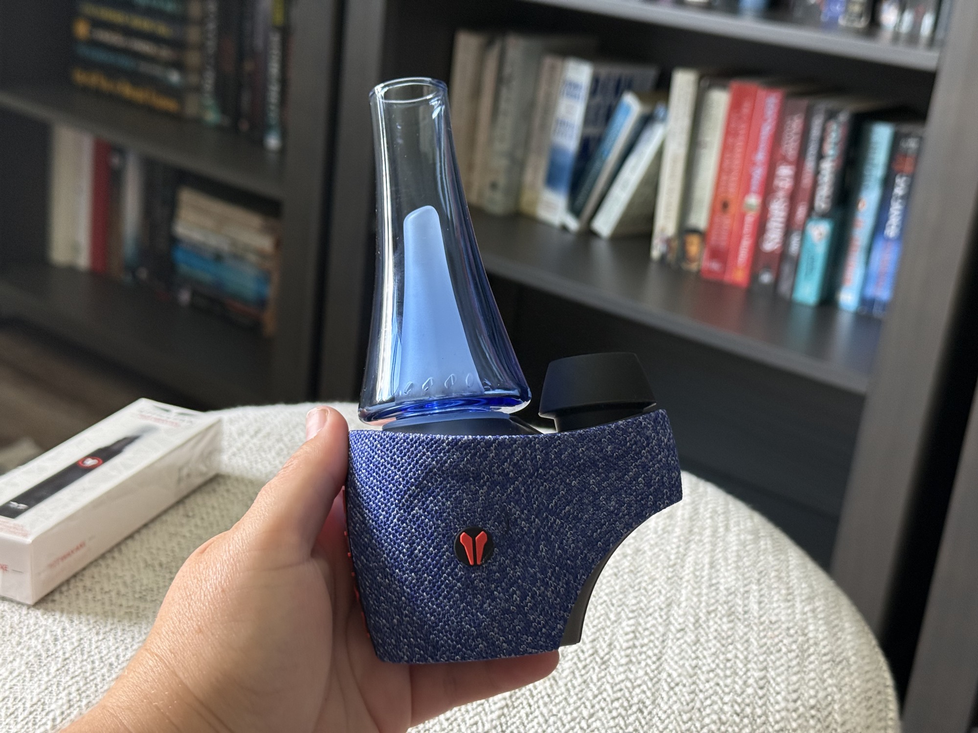 The assembled blue Utillian 8 Turbo held in one hand.