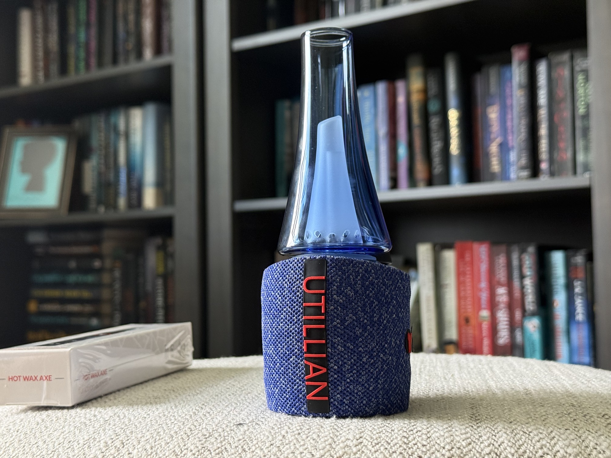 Side view of the blue Utillian 8 Turbo with red UTILLIAN lettering.